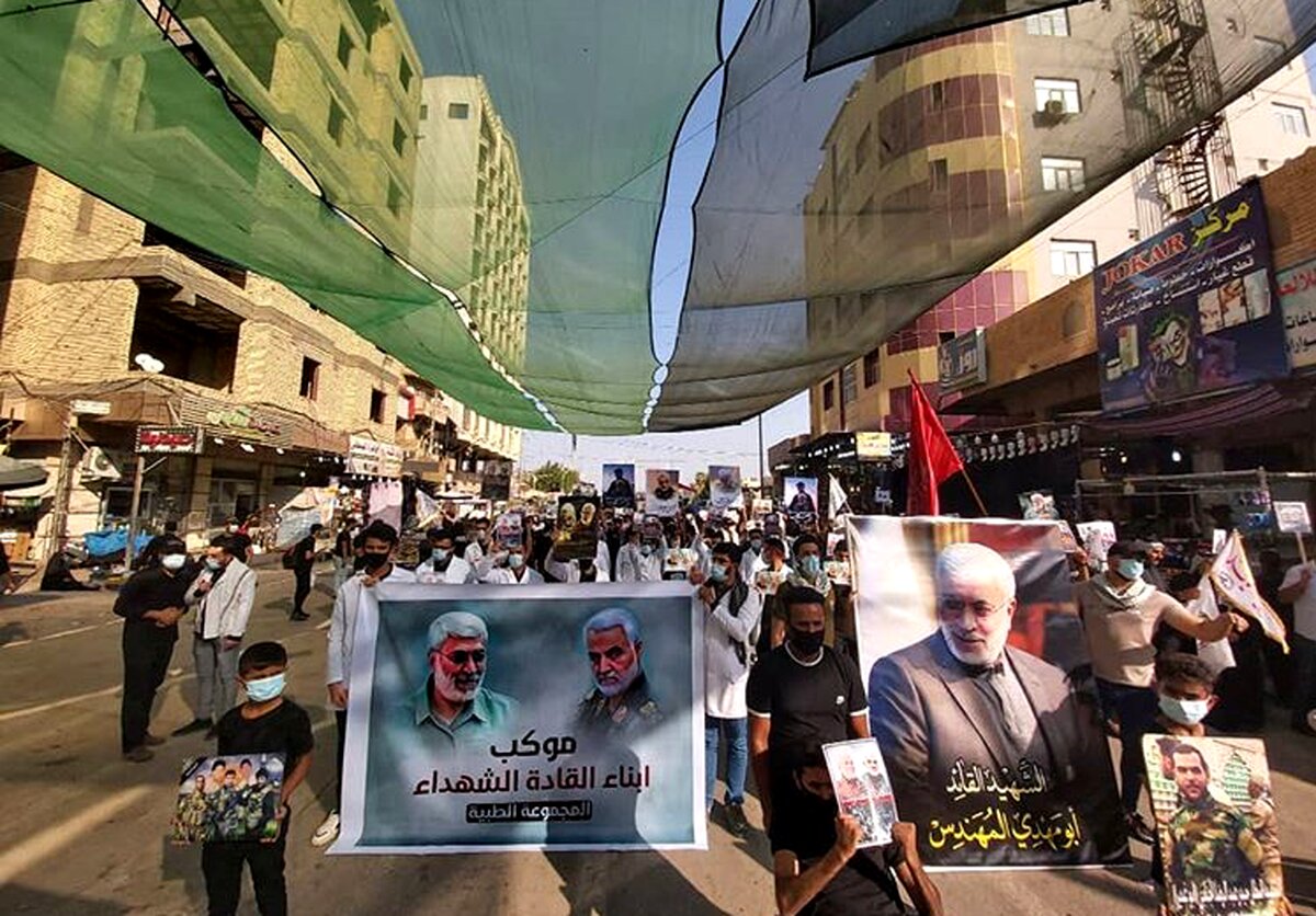 اعتراضات ضد آمریکایی با تصاویر حاج قاسم درکربلا؛فیلم