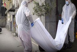 عکس جنازه قاضی فراری پرونده طبری در رومانی