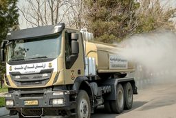 تصویر رزمایش زیستی ارتش ؛ ضدعفونی کردن شهرها با تجهیزات سنگین