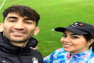 جشن لاکچری علیرضا بیرانوند و زنش در روز دربی | عکس زن علیرضا بیرانوند با لباس پرسپولیس و موهای قرمز همه رو مات کرد
