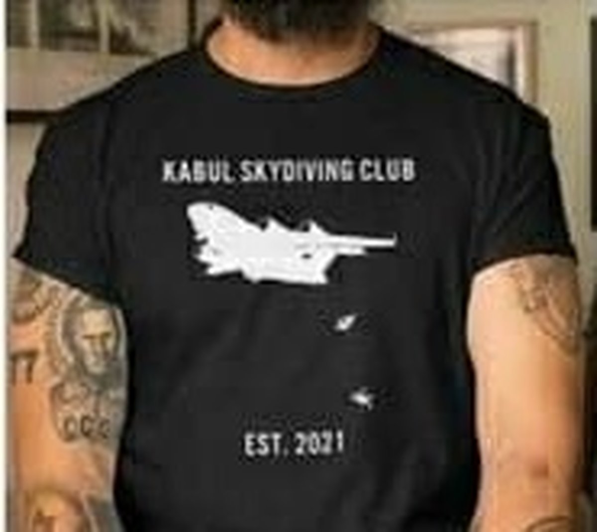 واکنش دستیار ظریف به تصاویر یک «تیشرت آمریکایی»